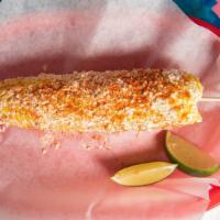 Mexican Street Corn · Corn On a Cob Coated With Crumbled Cotija Cheese, Light Mayo, Butter, and Spiced With Chili ...