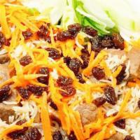 #34. Kabuli Pilao · Basmati rice cooked with chunks of lamb, carrots, raisins, veggie dish.