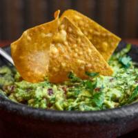 Top Shelf Guacamole · Made fresh at your table.