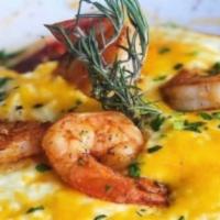Shrimp & Grits · Three Cheese Grits topped with Real bacon bits, Scallions, and Grilled Shrimp