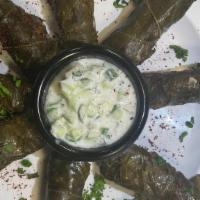 Dawali (Stuffed Grape Leaf With Meat) · Grape leaves stuffed with rice, garlic, parsley, tomato, meat and special spices served with...