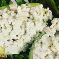 Twin Avocado Salad · Avocado stuffed with chicken salad over mixed greens lettuce, cherry tomatoes, cucumbers, bl...