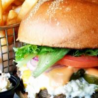 All American Burger · American cheese, coleslaw, sliced pickles, and thousand island dressing.