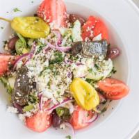 Greek Salad · Lettuce, tomato, onions, cucumbers, kalamata olives, pepperoncini and feta cheese. Served wi...