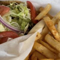 Chicken Gyro · Marinated white meat chicken, grilled to perfection, served with lettuce, tomatoes, onions a...
