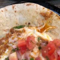 Quesadillas · Grilled flour tortilla, roasted chiles, onions, oaxaca and cheddar jack cheeses, pico de gal...