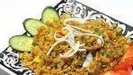 Fried Rice · White rice fried with chicken, salt, sugar, MSG, onion, red and green peppers, and curry pow...