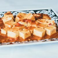 Spicy Sour Tofu · Spicy sautéed tofu prepared with onions, spring onions, and bell peppers in a special house ...