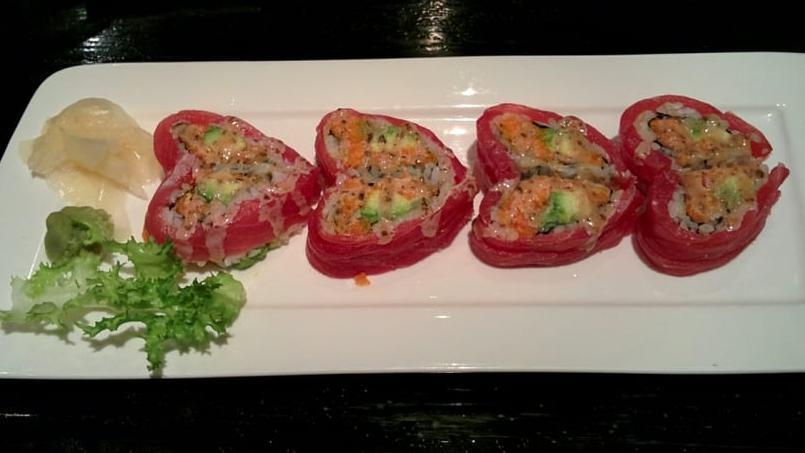 Sweet Summer · Shrimp tempura, spicy tuna, avocado inside, spicy crab meat and red tobiko on top.