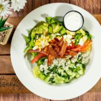 Cobb Salad · Romaine, blue cheese, tomato, cucumber, hard-boiled egg, bacon, ranch, or blue cheese dressi...