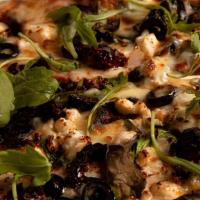 Napoli Pizza · Feta cheese, spinach, sundried tomatoes, black olives and Parmesan cheese.