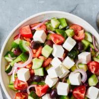 Greek Salad · Feta cheese,red onions, tomatoes, olives, mixed peppers ,Cucumber and served with balsamic d...