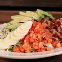 Cobb Salad · Chicken breast, bacon, crumbled bleu cheese, diced tomatoes, avocado and a hardboiled egg se...