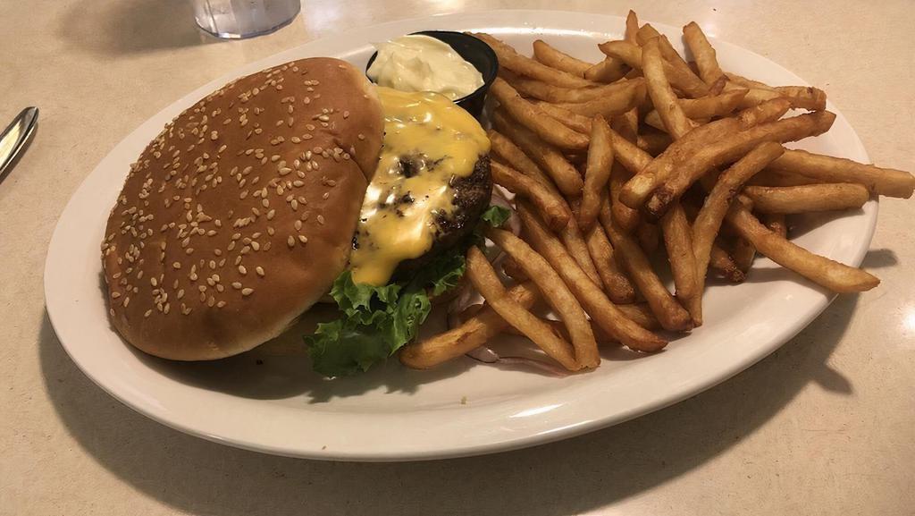 Bobtail Burger · 1/2 lb. beef patty with American cheese, lettuce, tomatoes, onions, pickles and 1,000 Island dressing. Served with fries.