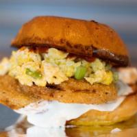 On The Farm · Fried green tomato, whipped goat cheese, ketchup, soft scrambled eggs on a brioche bun.