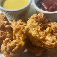 Chicken Tender Appetizer · Lightly fried chicken, served with our in house honey mustard and hickory sauce