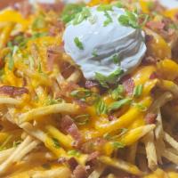 Loaded French Fries · our french fries topped with cheddar cheese, jack cheese, bacon, green onion and sour cream