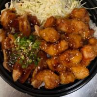 Chicken & Honey Sesame Chicken · Chicken with honey sesame chicken with rice and salad