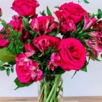 Magenta · Magenta bouquet of roses, glass vase included