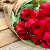 Red Rose Dozen Wrapped · 12 Classic Red Dozen Roses with accent filler, wrapped and tied off with a plush ribbon. A r...