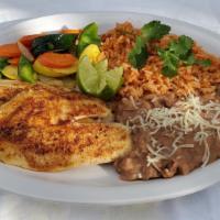 Tilapia Platter · Grilled fish comes with sauteed vegetables, on white sauce wine, butter and garlic, beans, r...