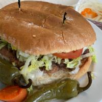 Tortas · Mayonnaise, refried beans, lettuce, avocado, tomatoes, and sour cream with meat (steak, mari...