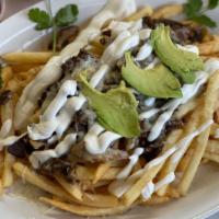 California Nachos · French fries, choice of meat and oven melted cheese, topped off with sour cream and avocado.