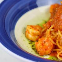 Gamberi Fra-Diavolo · Argentinian prawns sautéed in a spicy tomato sauce accompanied with linguini pasta