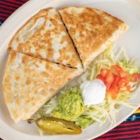 Quesadilla Grande  · Served with lettuce, tomato, sour cream, and guacamole on the side, with your choice of faji...