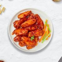 Buffalo Biz Wings · (6 pieces) Fresh chicken wings breaded, fried until golden brown, and tossed in buffalo sauc...