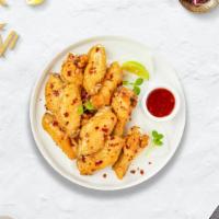 Thai Spice Wings · (6 pieces) Fresh chicken wings breaded, fried until golden brown, and tossed in Thai chili s...