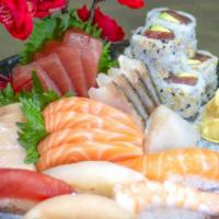 Sushi & Sashimi Combo · Five pieces of sushi, 16 pieces of sashimi, and one tuna roll. Served with miso soup or salad.