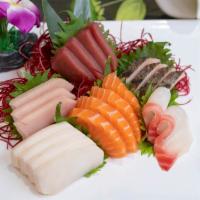 Sashimi Deluxe (21 Pieces) · Served with miso soup or salad.