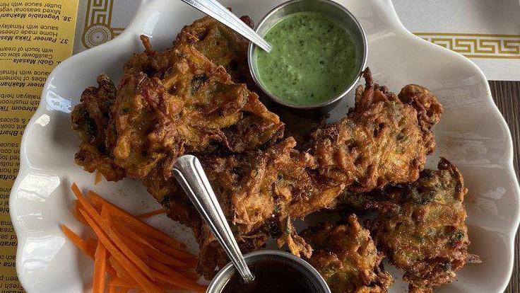 Vegetables Pakora · Onion, spinach, cabbage batter with chickpeas flour deep fried with Himalayan herbs and spices. Serve with mint chutney.