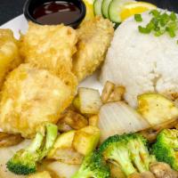 Fish Katsu · Lightly battered deep fried fish fillet, served with white rice and side of vegetable.