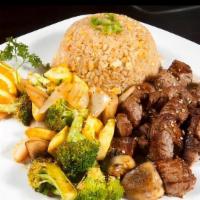 Ny Strip · Teppanyaki style grilled NY steak to desired temperature,  side of fresh vegetable, and frie...