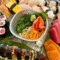 Misawa Special · Twelve pieces sashimi, twelve pieces nigiri, tuna roll or California roll, special roll, che...