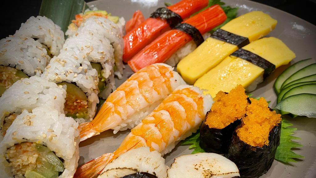 Sushi Combination · Eight pieces nigiri, tuna roll or California roll.