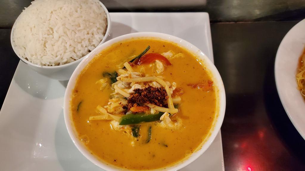 Red Curry · With red curry sauce and coconut milk, prepared with bamboo strips, bell peppers, and fresh basil.