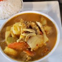 Yellow Curry · With yellow curry sauce and coconut milk, prepared with potatoes, carrots, and onion.