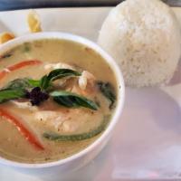 Green Curry · With green curry sauce and coconut milk, prepared with bell peppers, eggplant, and fresh bas...