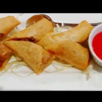 Crispy Egg Rolls (3) · Combination of chopped chicken, cabbage, carrots, white onion, celery, and bean thread noodl...