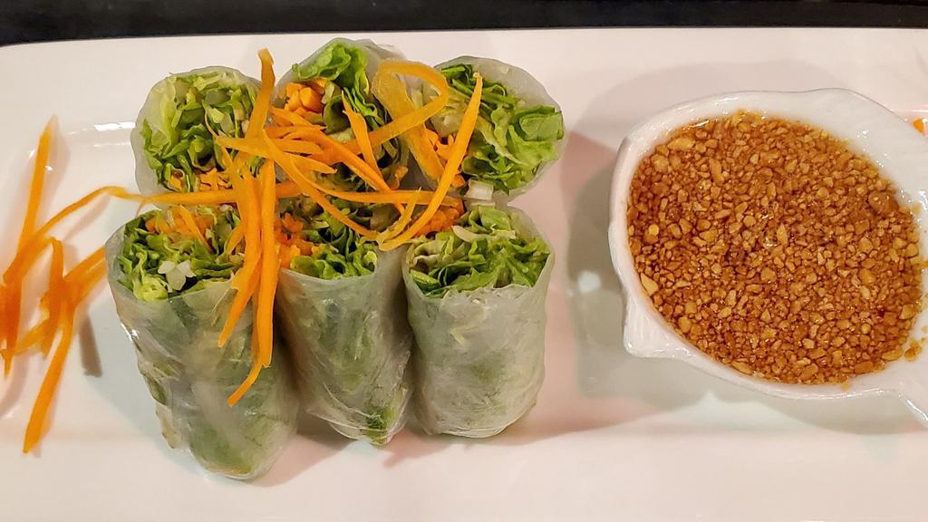Fresh Spring Rolls (3) · Combination of green leaf lettuce, chopped chicken in bean thread noodle, bean sprouts, mint, and cilantro wrapped in rice paper. Served with crushed peanut sauce.