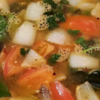 Tom Yum Soup · Lime and lemongrass broth with tomato, onion, mushrooms, and cilantro. Choose chicken, veggi...