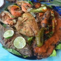 Mar Y Tierra · Fried whole Fish, Filet Tilapia, Steak, Beef Ribs, 3 jumbo shrimp's, Pork sausage, serve wit...