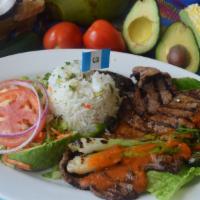 Churrasco  · Steak with scallion, serve with rice, beans ,russian salad & fresh made tortilla