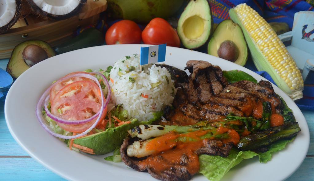 Churrasco  · Steak with scallion, serve with rice, beans ,russian salad & fresh made tortilla