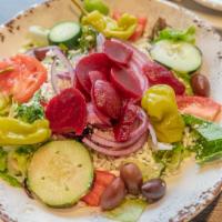 Greek Salad · Tomatoes, cucumbers, olives, beets, red onions, pepperoncini, Feta cheese. Add Chicken or Gy...