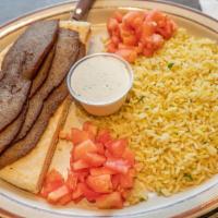 Gyro Plate Dinner · Seasoned lamb and beef, onions, tomatoes, Tzatziki sauce, pita bread, rice.