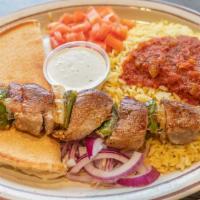 Shish Kebab · Marinated Pork tenderloin skewered, green peppers, onions, pita bread, rice.